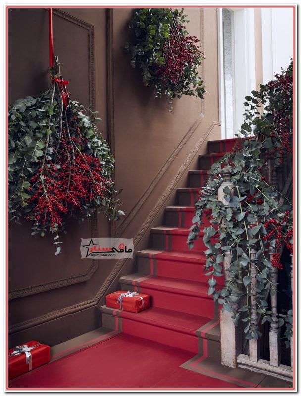 christmas garland on stairs railing